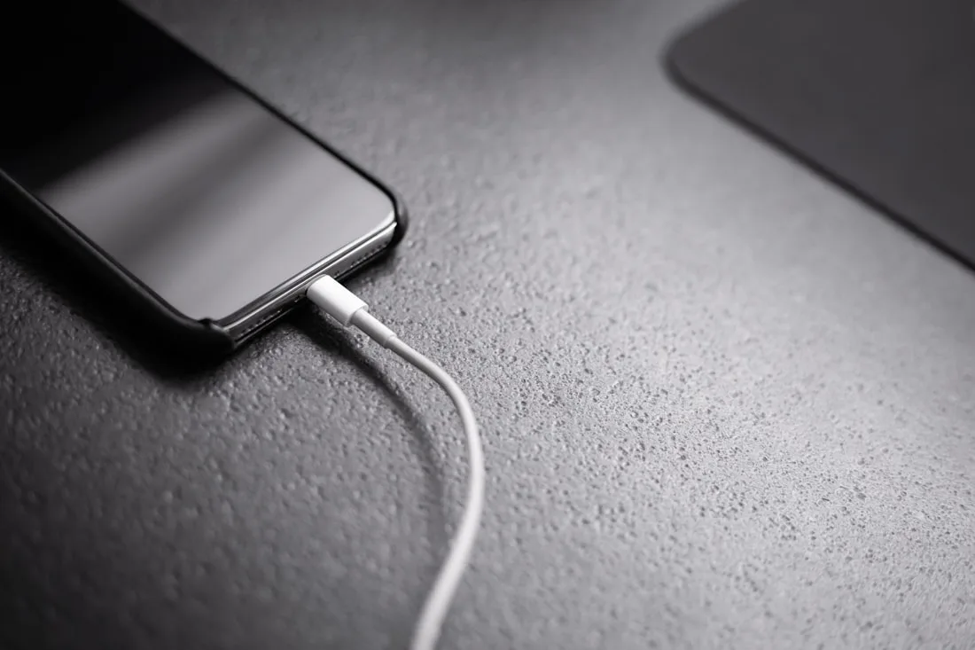Smartphone being charged