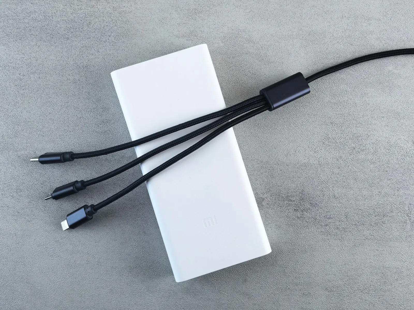 Power bank and charging cables on a desk
